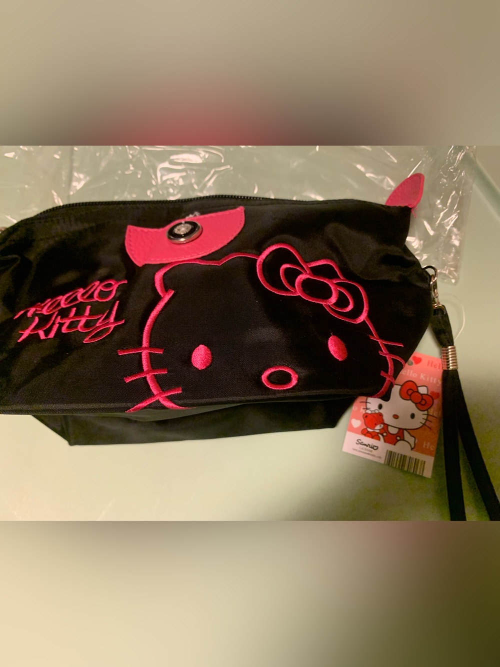 Brand new in bag official Hello Kitty Black Wristlet Pouch
